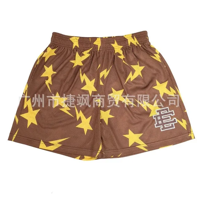 Eric Emanuel × BAPE Star Mesh Shorts Brown with Yellow Stars