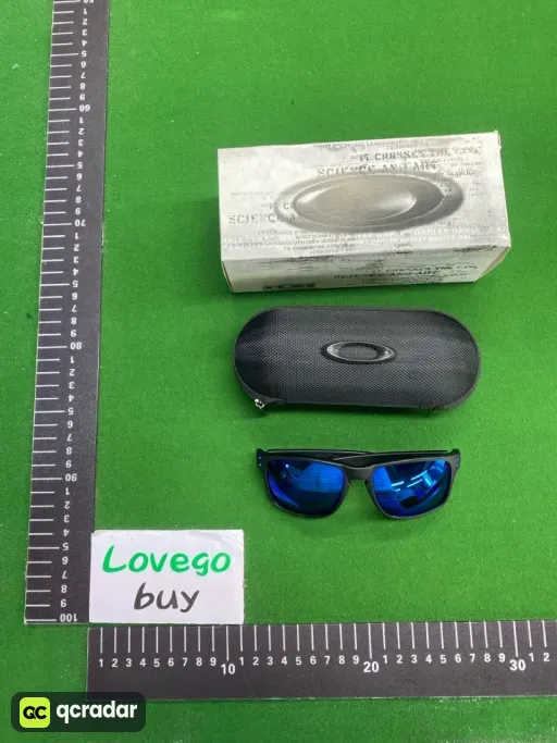 Black frame, blue label, blue lens