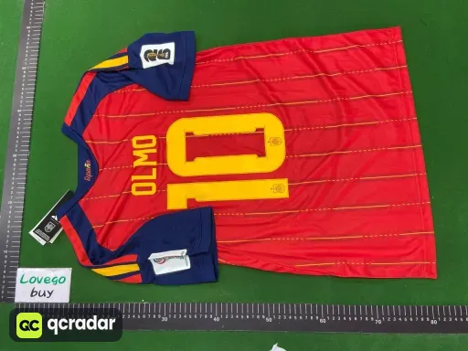 Spain home jersey, number 10 with captain's armband