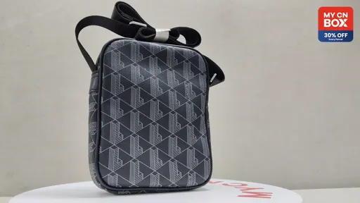 Black [printed vertical crossbody bag]