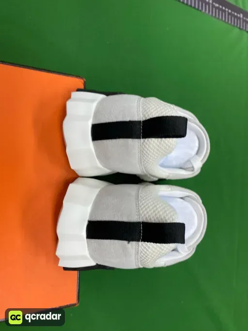 1 white mesh bag and black webbing