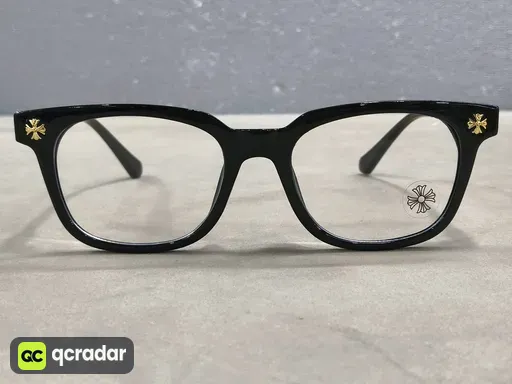 Black frame gold accessories