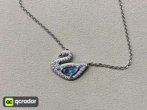 Blue diamond swan necklace