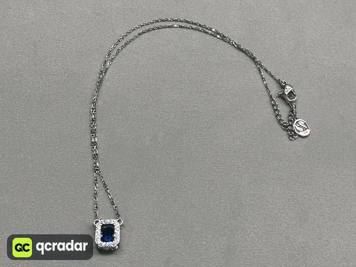 Sugar cube white gold and blue diamond necklace