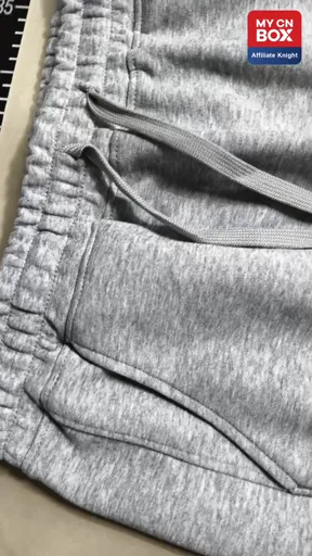 Embroidered grey pants with lettering