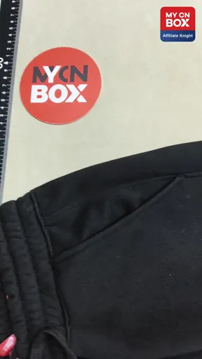 Embroidered black pants with lettering and fleece lining