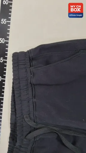 Embroidered black pants with lettering