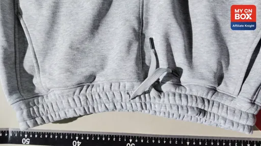Embroidered grey fleece-lined pants with lettering