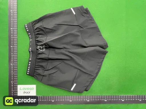 Patterned short-sleeved green = patterned shorts black