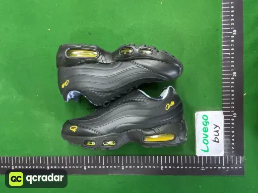 Collaboration black gold swoosh