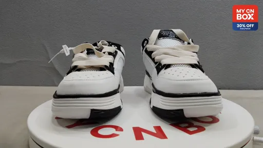 Am white with black edges