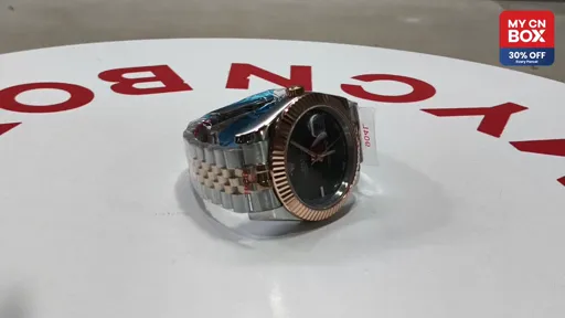 Two-Tone Rose Gold Green Roman Dial · Five-Link Steel Bracelet